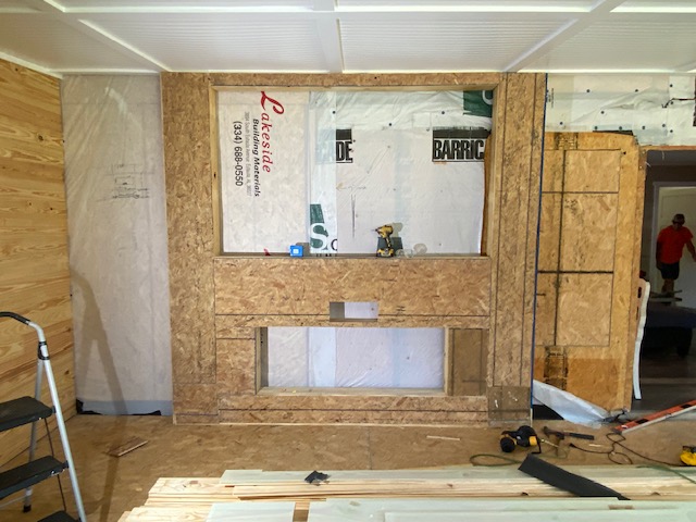 Framed wall niche with plywood and insulation