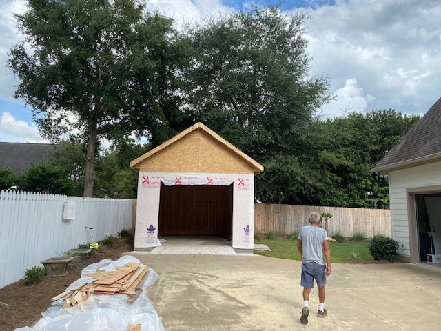 Framed garage shell nearing completion