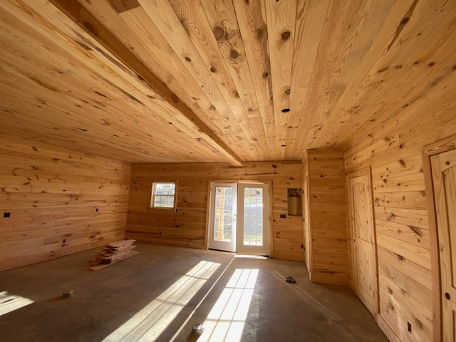 Roof rafters and ridge beam inside an unfinished attic